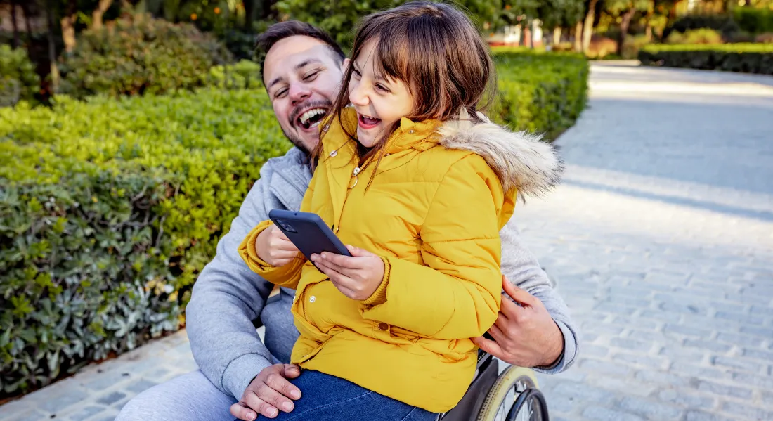happy disabled parent with child